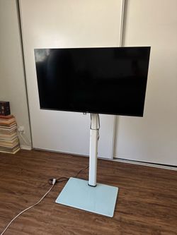 40” tv / tv stand and soundbar