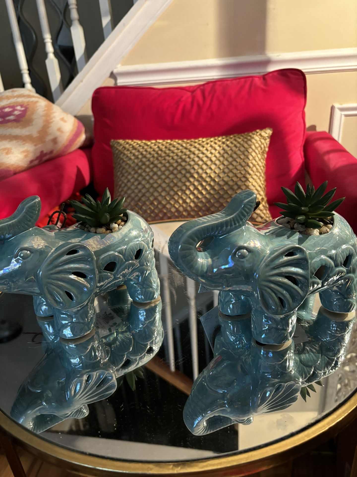 Two Teal Elephants With Artificial Plants