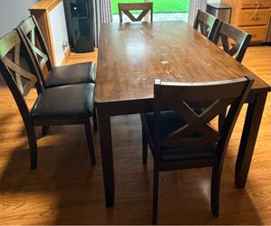Wooden dining table with 6 chairs