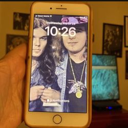  iPhone 8 Plus 64 GB White Unlocked, comes with case and pop socket as pictured. Gold rim. Back of phone is white/cream color. Excellent pre owne