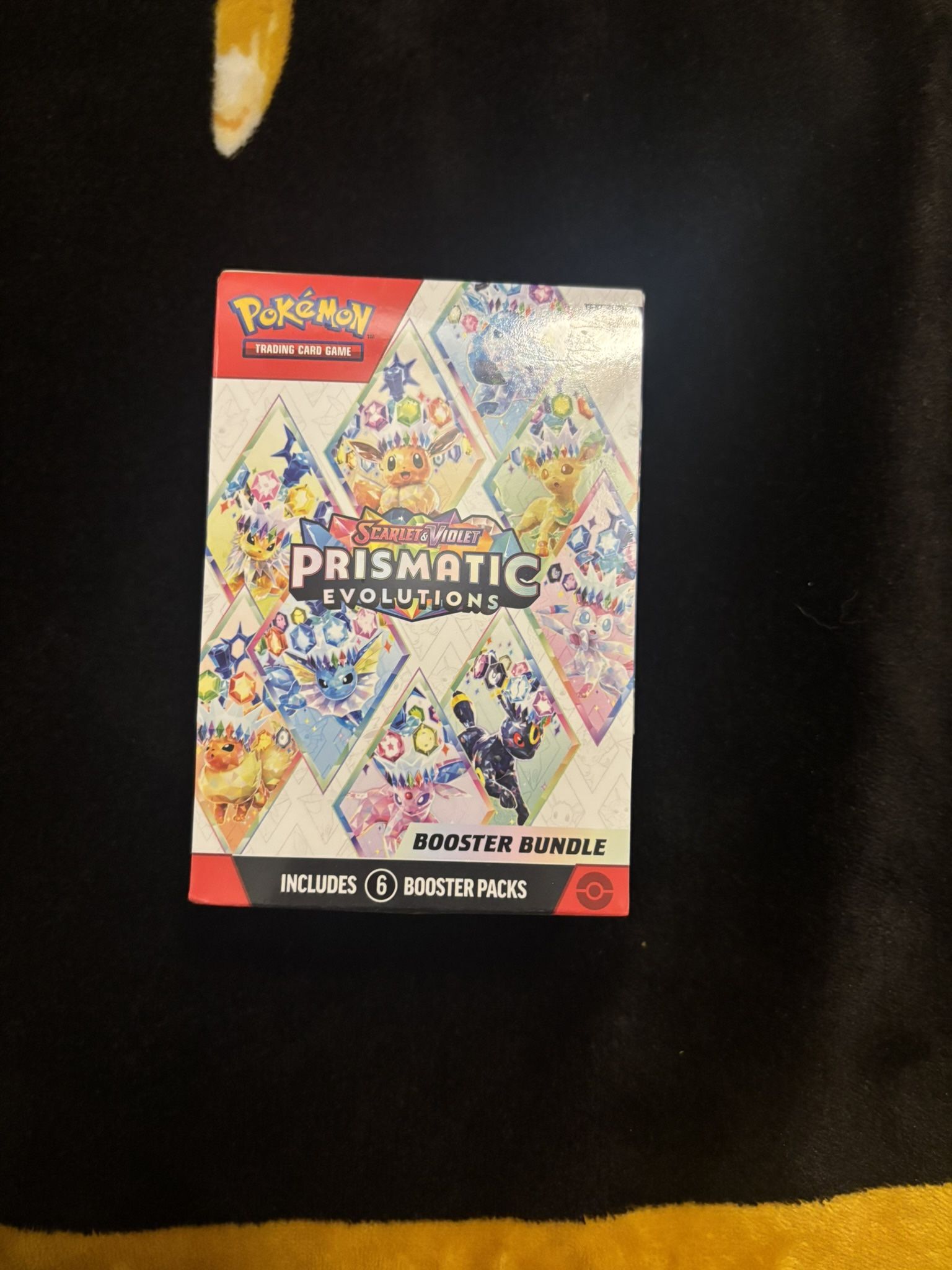 Prismatic evolutions booster bundle 