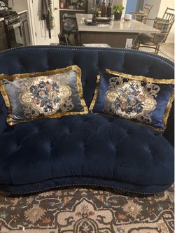 Fancy blue and gray embroidered pillows with Gold Fringe