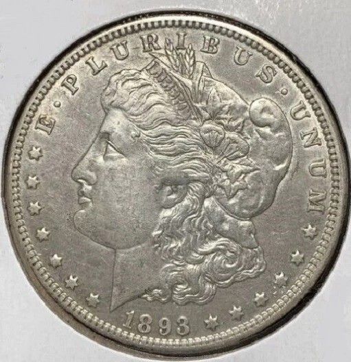1893 CC Morgan Silver Dollar cleaned