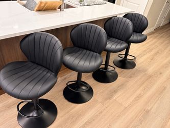 Set of 4 Black Adjustable Swivel Bar Stools – Excellent Condition