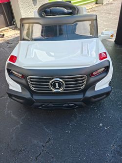 White electric ride on SUV for kids