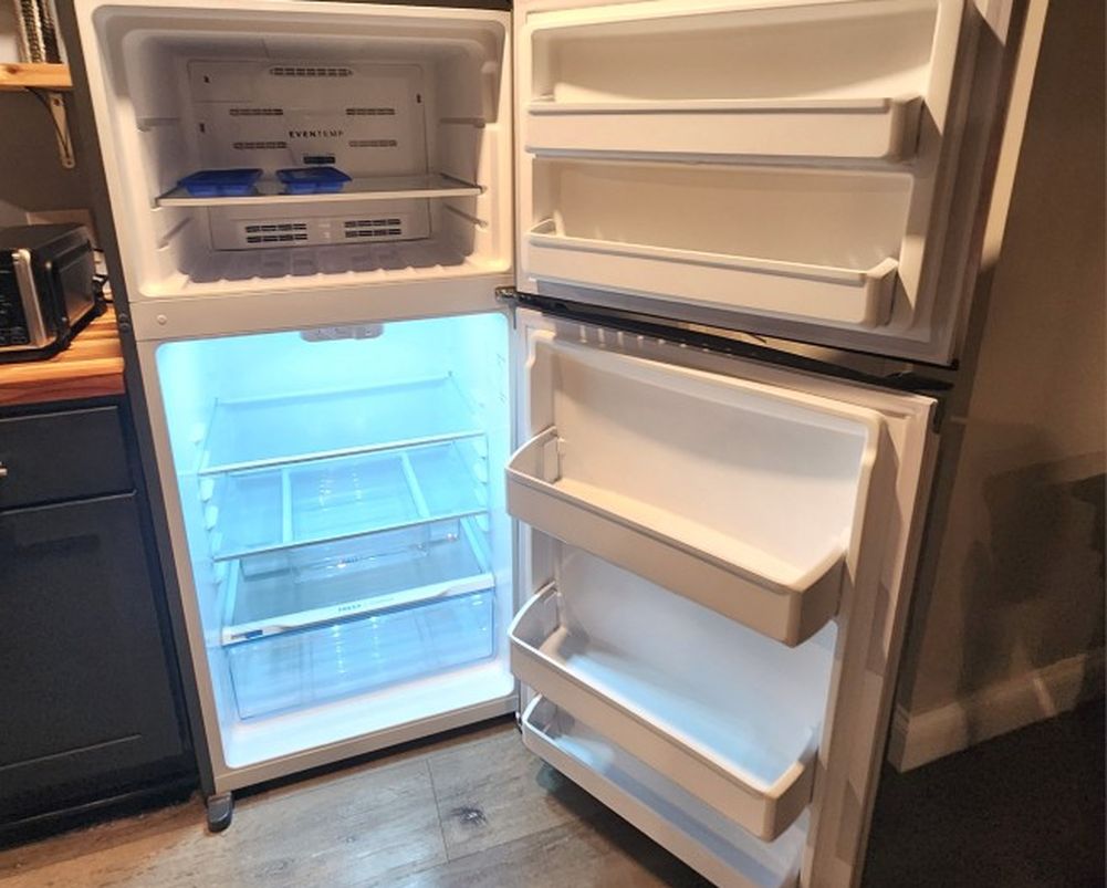 27" W x 60" H - One y/o refrigerator