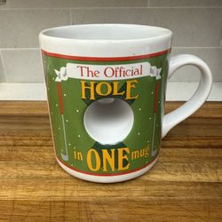 "The Official Hole in One" golf-themed ceramic coffee mug by Papel Freelance