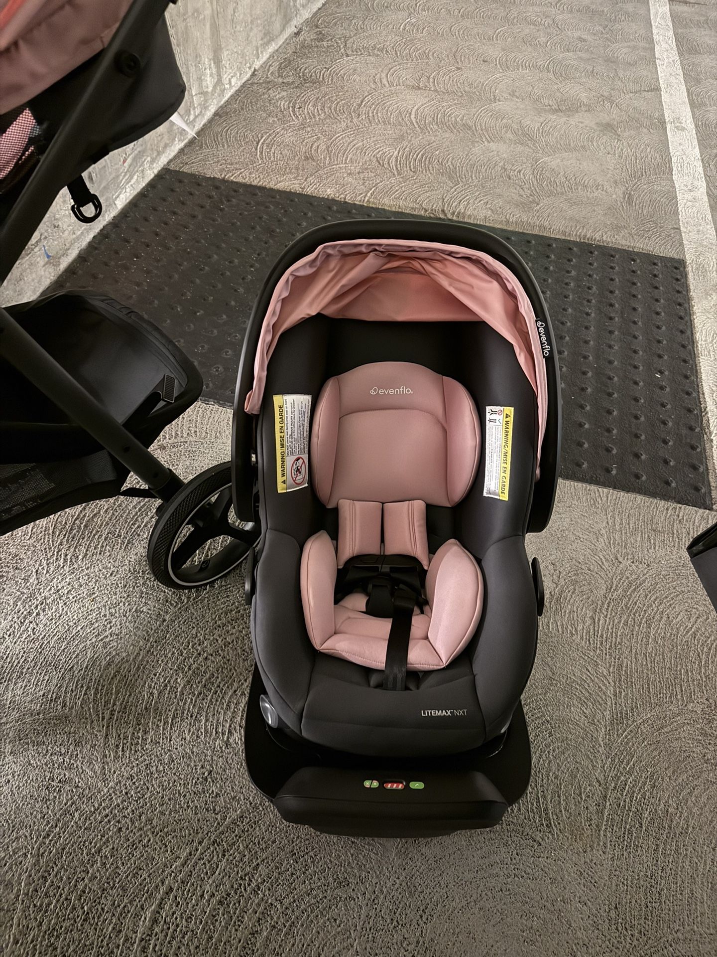 Evenflo Shyft Intuiti Travel System with Revolve180 Rotational Infant Car Seat & stroller (Pink)