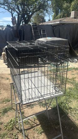 Pet cage with bottom tray 24 inche high by 22 wide by 35 3/4 long