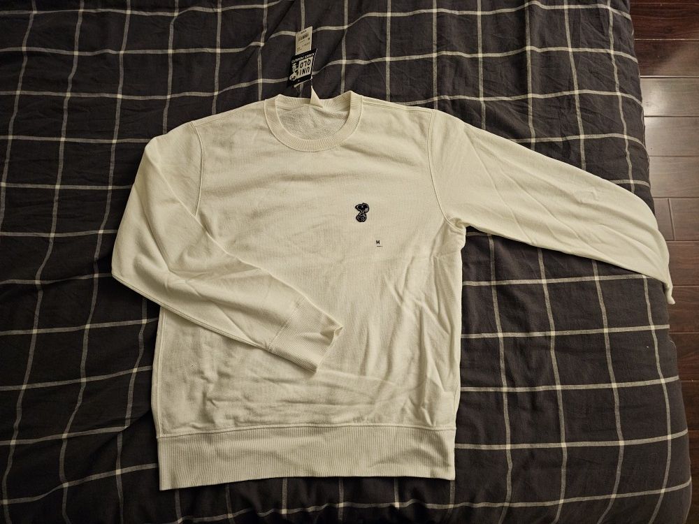 KAWS x Uniqlo x Peanuts Snoopy Sweatshirt