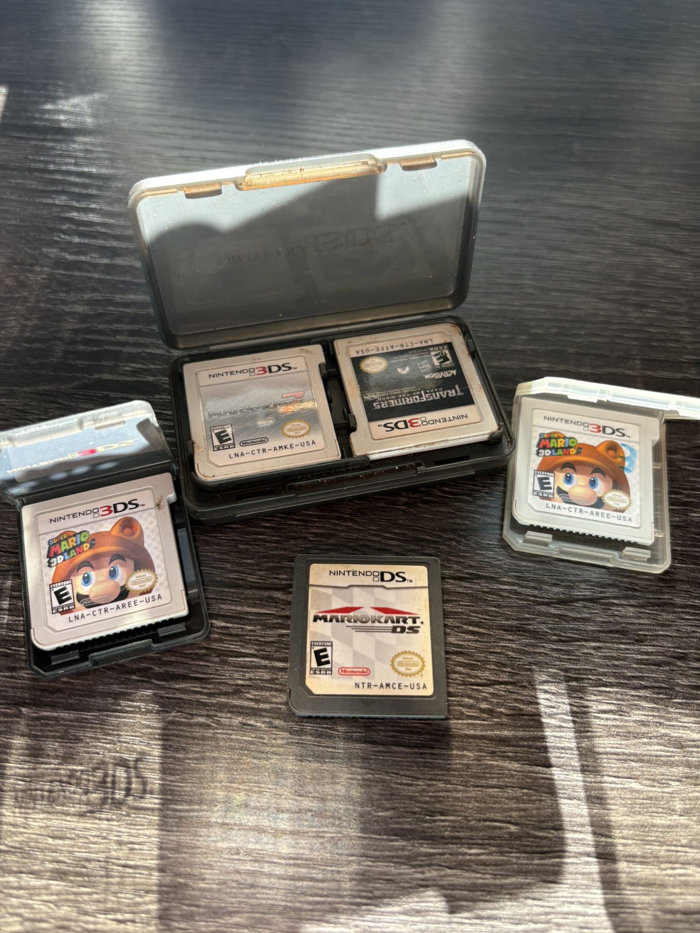 Nintendo 3DS Game Cartridge Collection with Black and White Cases
