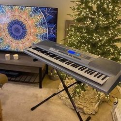 Yamaha Portable Grand 76-Key Electronic Music Keyboard with Portable Stand & Charger