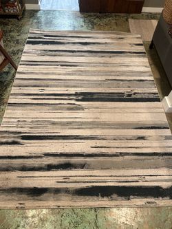 6’7” x 9’6” Area Rug