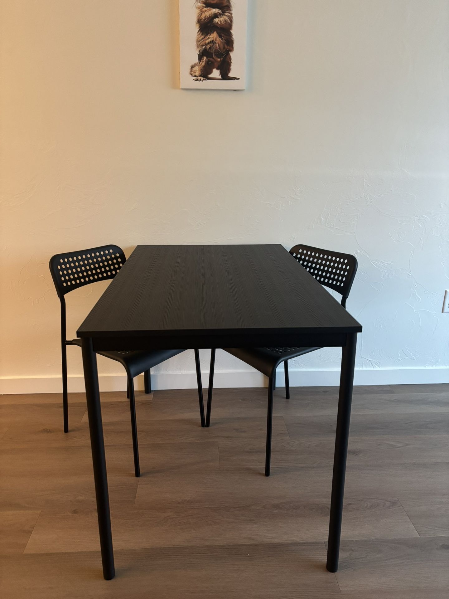 Ikea Black Wood Dining table & Plastic Chairs