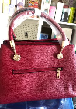 Bolsa elegante color vino