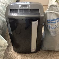 12,500 BTU air conditioner with remote bag covers and window and tubes