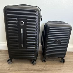 2 piece Delsey suitcase
