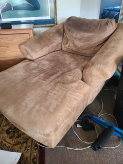 Chair and attached Ottoman