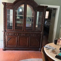China Cabinet With Finger Touch Light  $250. obo