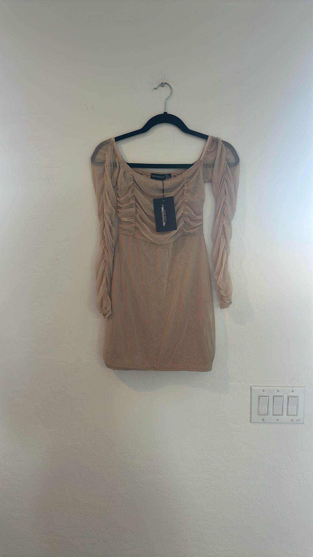 Pretty little things tan dress with sheer sleeves size 6