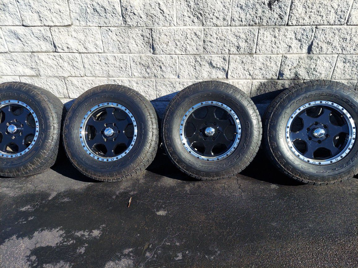 265x70x17 set of 4 news tires and rims