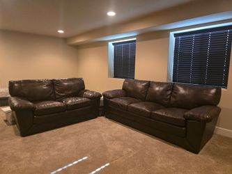 Leather sofa & loveseat set $350