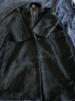 Gabardina de mujer nueva. Talla Mediana.