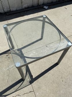 Glass top end table.