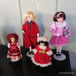 Set of 4 Porcelain Collector Dolls