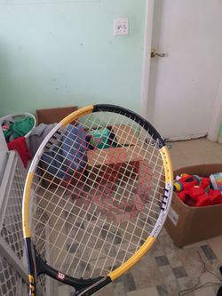 Wilson tenies racket