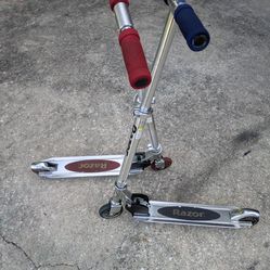 Two RaZor Brand Stand Up Scooter