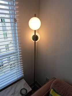 Brass dual-globe floor lamp