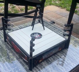 WWE action figures and wrestling ring for sell (negotiable)