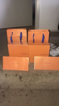 2 Louis Vuitton belts