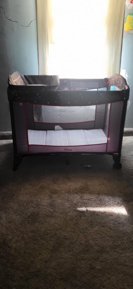 Disney Pack-n-Play W/ Changing table & storage Compartment