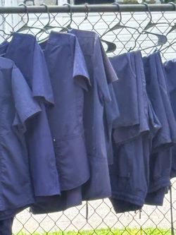 Navy gray scrubs.