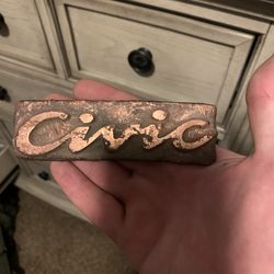 Solid copper cast civic logo