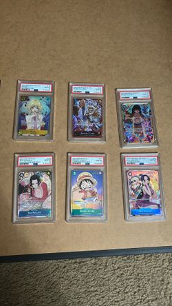 One Piece PSA 10 slabs
