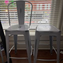 Three Distressed White Metal Bar Stools