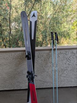 Atomic Pro lite Vantage skis, boots and helmet (women's)