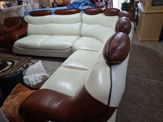 Modern leather sectional with matching chair
