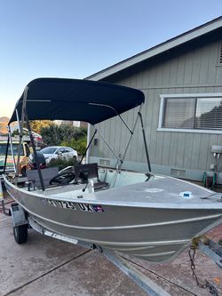 15’ Aluminum Fishing Boat w/ 25HP Mercury 4-Stroke & Trailer —