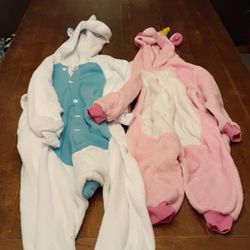 2 unicorn onesies one says size 8 but it looks like a 6 for girls.