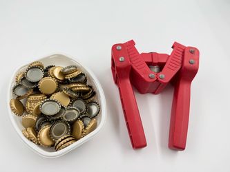 Bottle capper and new caps