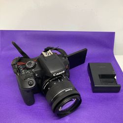 Canon EOS Rebel T7i 24.2MP Digital SLR Camera with EF-S 18-55mm IS STM Lens and Charger