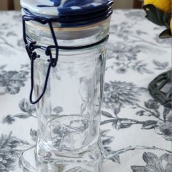 Glass Bottle with Embossed Leaf Design & Ceramic Cap