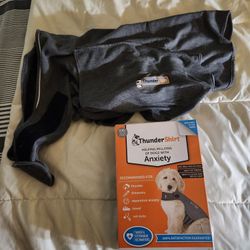 New XXL THUNDER SHIRT.   ITS TOO BIG FOR MY DOG