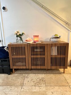 Credenza storage cabinet entry