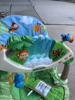 Baby bouncer and recliner with music and visual entertainment