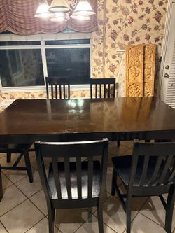Dining table and 6 chairs